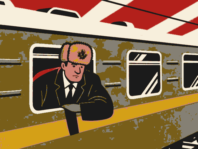 A man in a fur hat leans out of the window of a green train